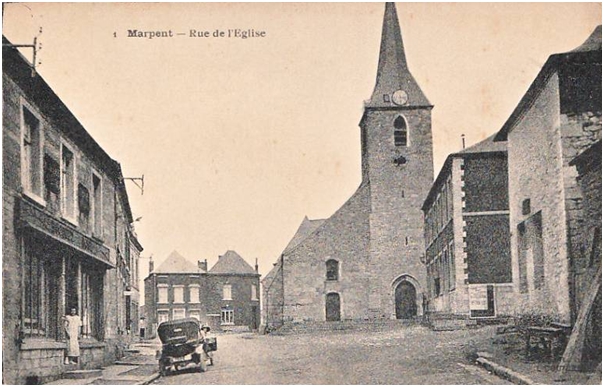 La rue de l'église à Marpent sur une carte postale ancienne